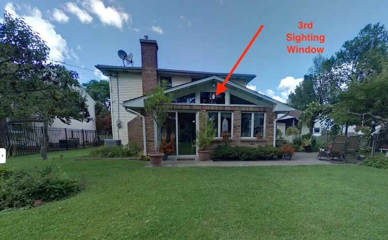 The back of the house with an arrow marking the window of the third sighting